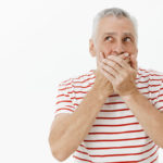 Shocked Senior Man Shut Mouth Concerned Looking Upper Left Corner (1)